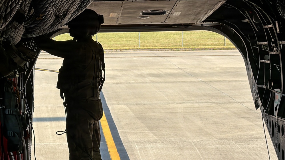South Carolina National Guard Chinook unit recovers damaged aircraft from field in Savannah