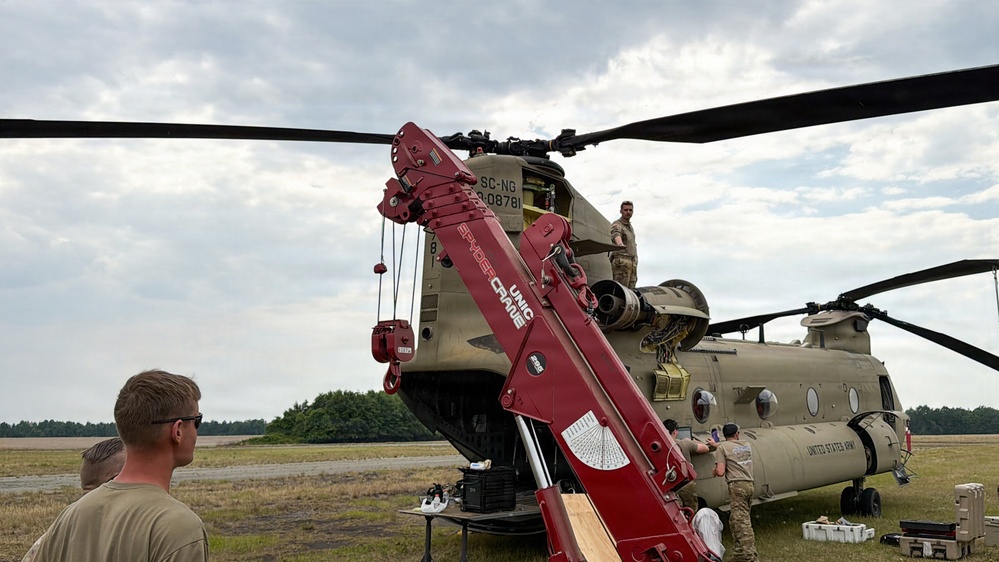 South Carolina National Guard Chinook unit recovers damaged aircraft from field in Savannah