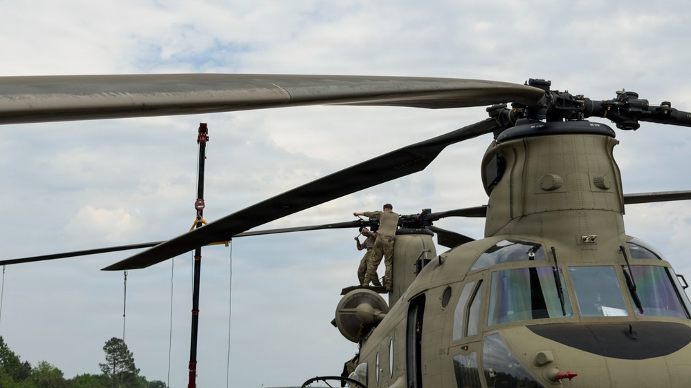 South Carolina National Guard Chinook unit recovers damaged aircraft from field in Savannah