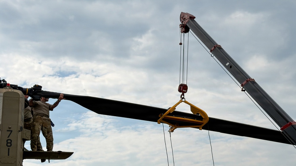 South Carolina National Guard Chinook unit recovers damaged aircraft from field in Savannah
