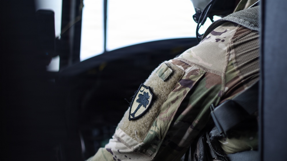 South Carolina National Guard Chinook unit recovers damaged aircraft from field in Savannah