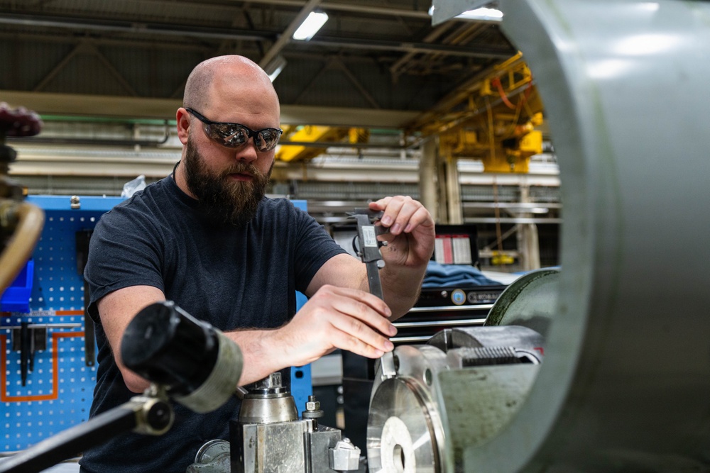Trident Refit Facility - Bangor Machinist Shop and Pipe Fitters Shop conducts daily manufacturing.