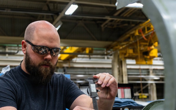 Trident Refit Facility - Bangor Machinist Shop and Pipe Fitters Shop conducts daily manufacturing.