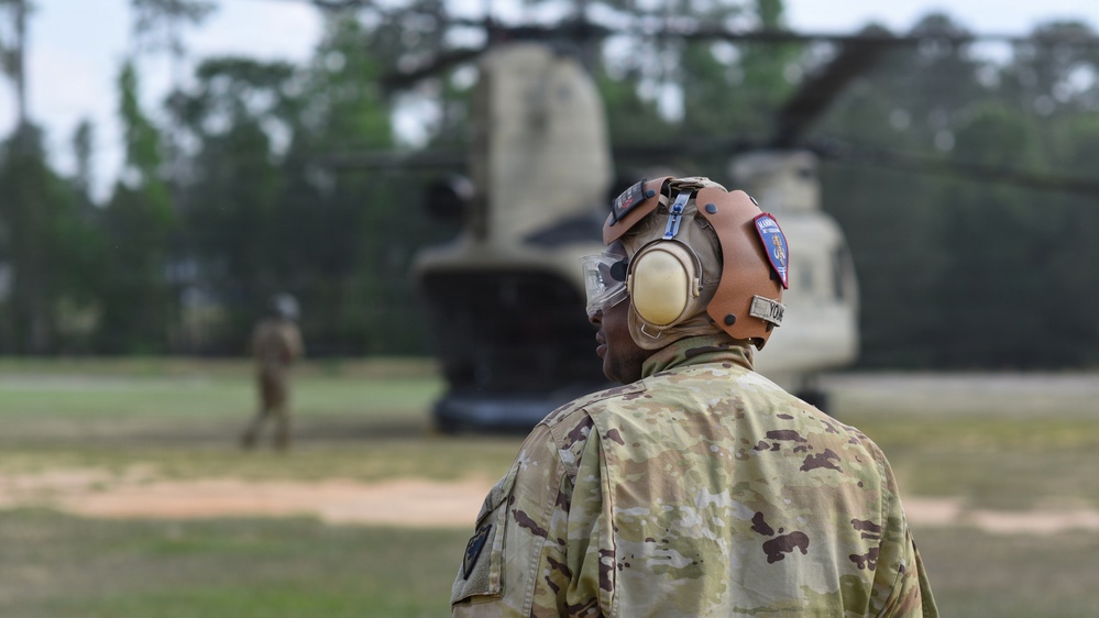 South Carolina National Guard Chinook unit recovers damaged aircraft from field in Savannah