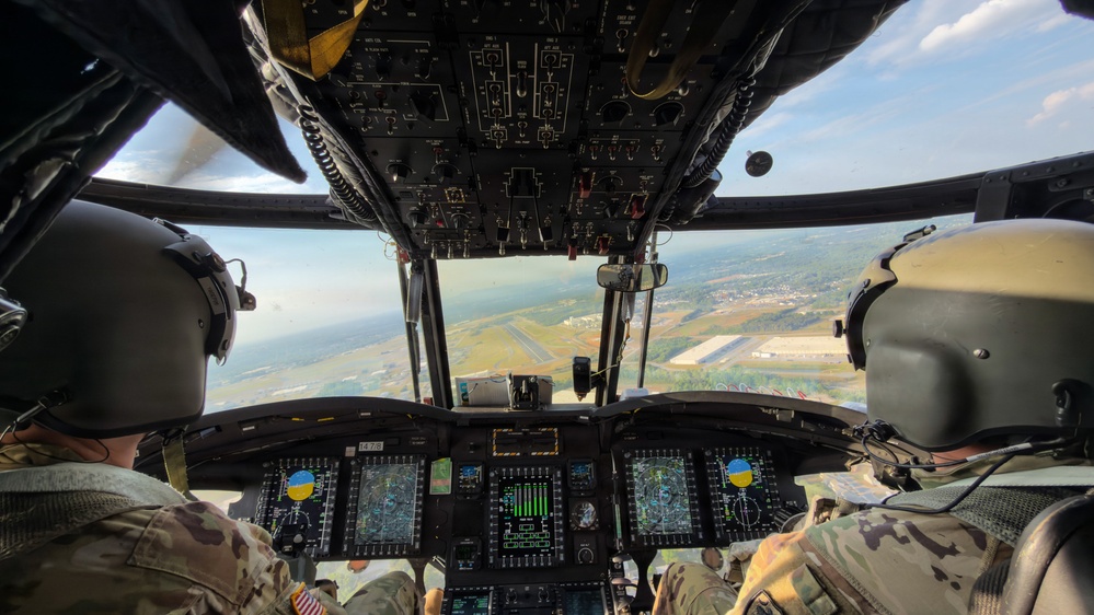 South Carolina National Guard Chinook unit recovers damaged aircraft from field in Savannah