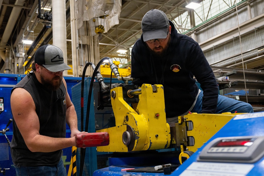 Trident Refit Facility - Bangor Machinist Shop and Pipe Fitters Shop conducts daily manufacturing..