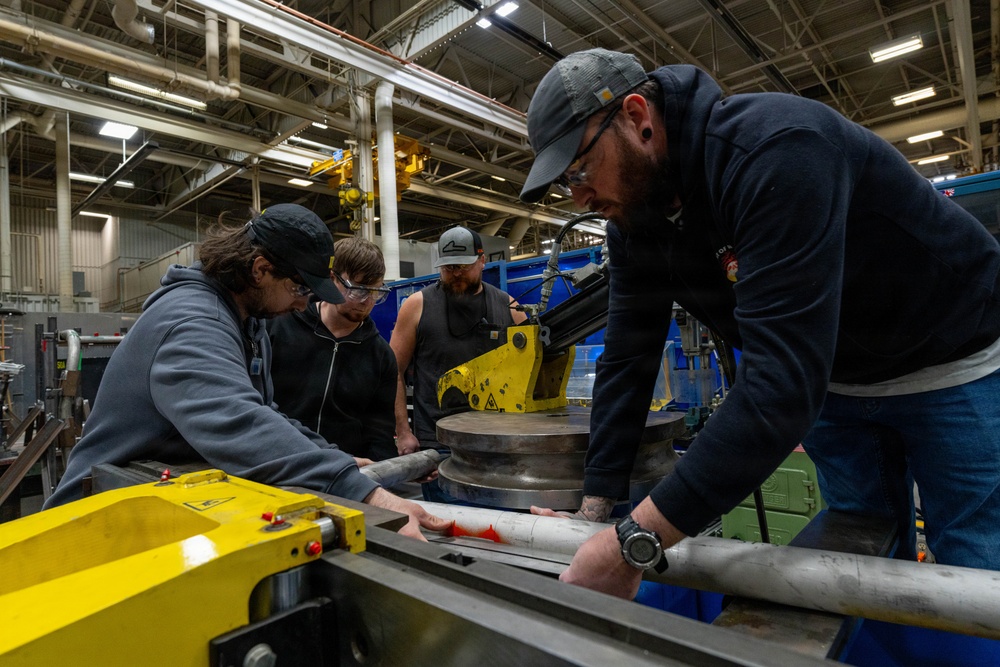 Trident Refit Facility - Bangor Machinist Shop and Pipe Fitters Shop conducts daily manufacturing.