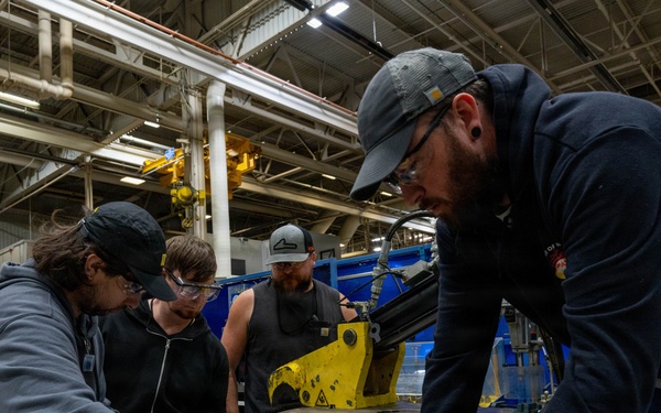 Trident Refit Facility - Bangor Machinist Shop and Pipe Fitters Shop conducts daily manufacturing.