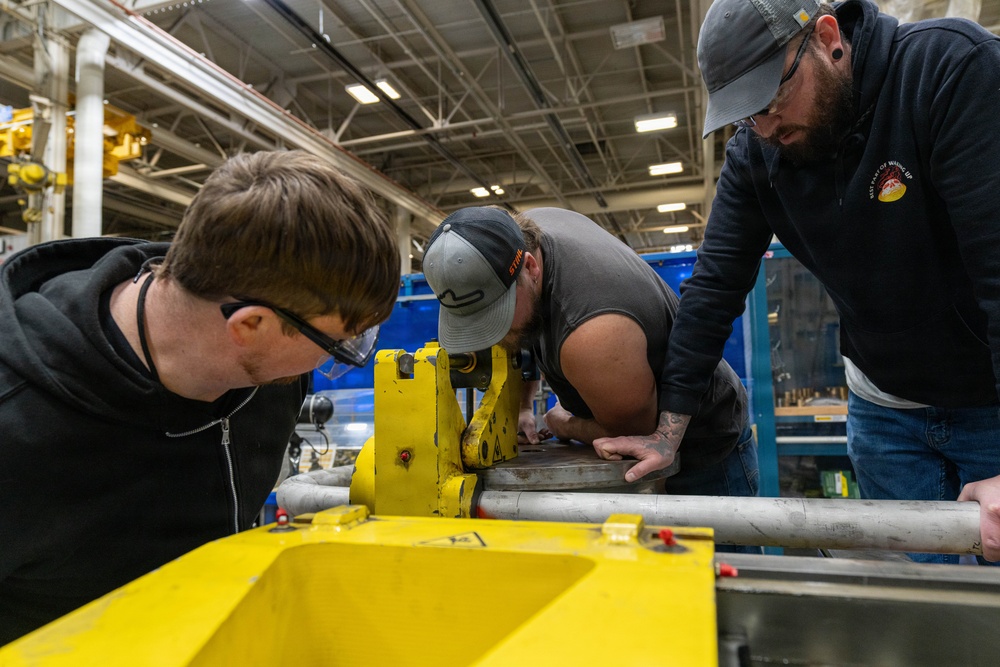 Trident Refit Facility - Bangor Machinist Shop and Pipe Fitters Shop conducts daily manufacturing.