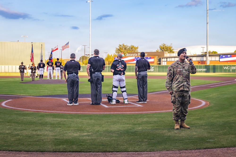 09.03.2025 MCoE Band Vocalist signs national anthem at Clingstones game
