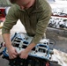Wyoming Air National Guard maintenance specialist repairs diesel engine