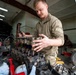 Airman prepares diesel engine for reassembly