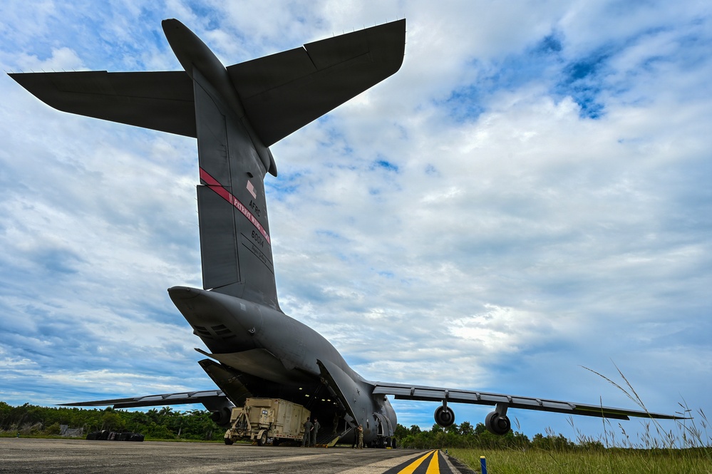 346th AEW Airmen load cargo into a C5 Galaxy