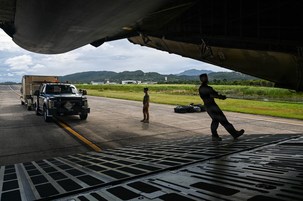346th AEW Airmen load cargo into a C5 Galaxy