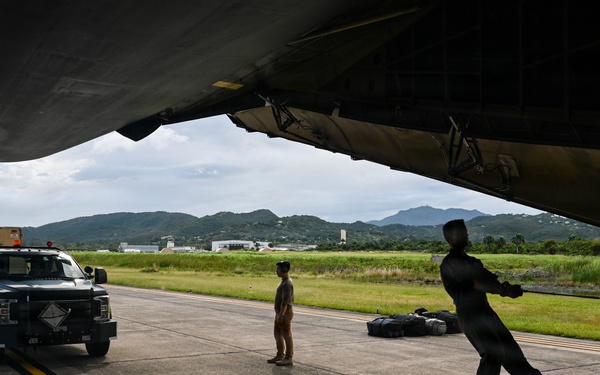 346th AEW Airmen load cargo into a C5 Galaxy