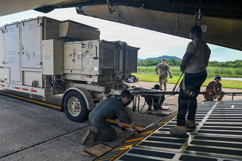346th AEW Airmen load cargo into a C5 Galaxy