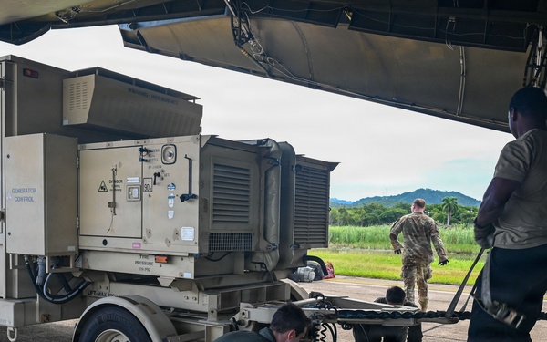 346th AEW Airmen load cargo into a C5 Galaxy