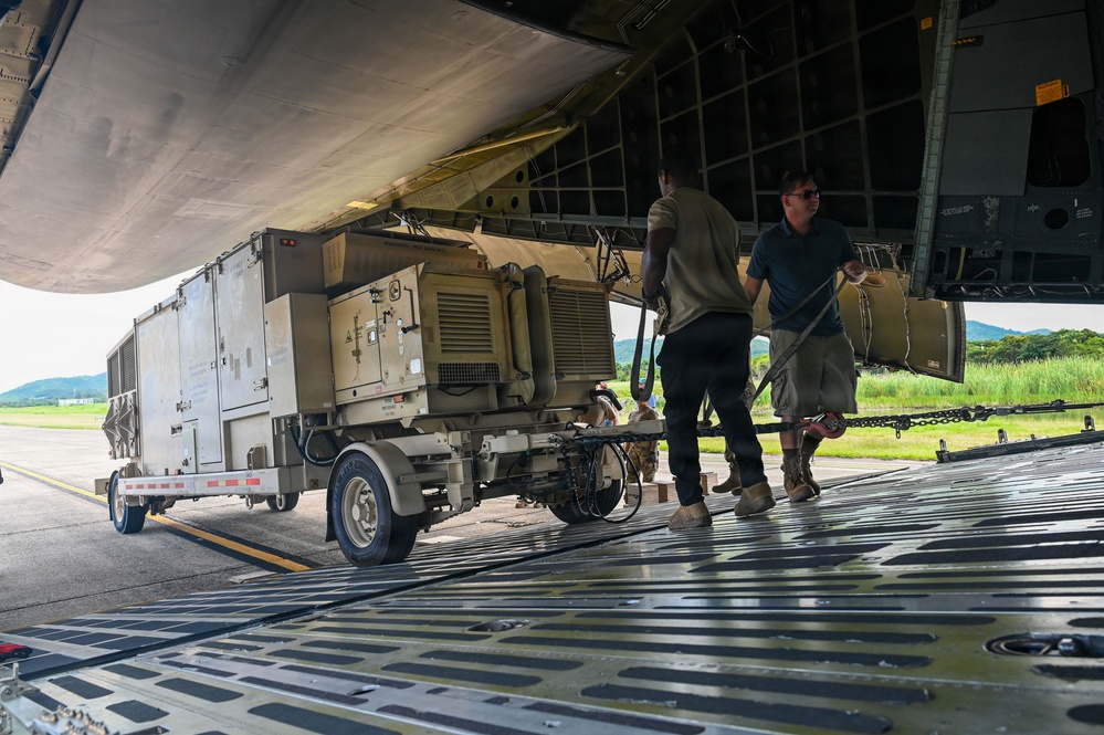 346th AEW Airmen load cargo into a C5 Galaxy