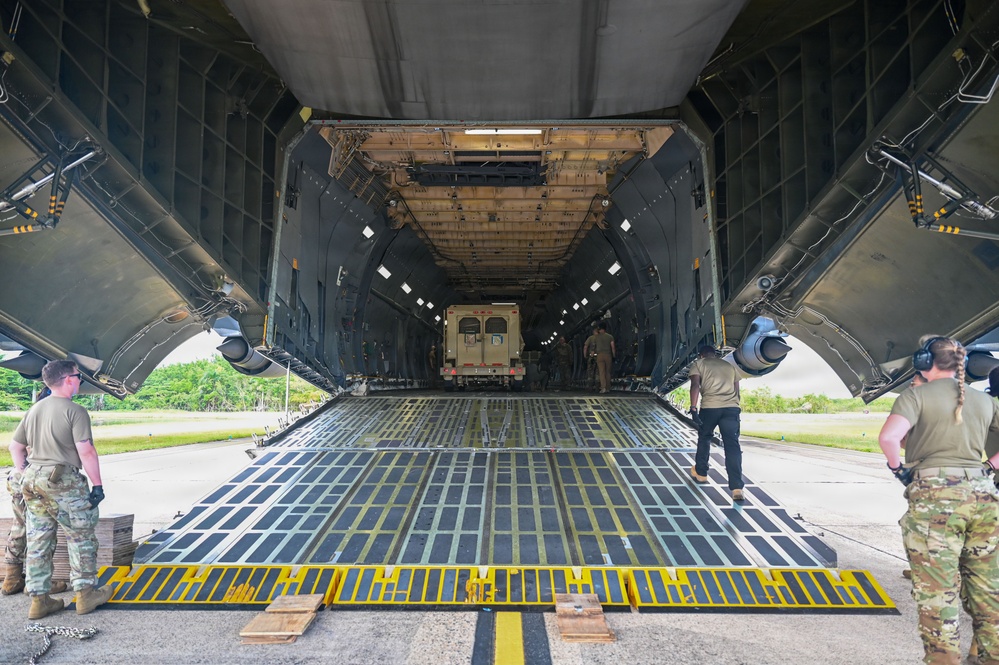 346th AEW Airmen load cargo into a C5 Galaxy
