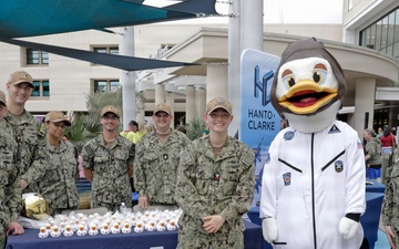 Pensacola Service Members Visit Hospital for National Superhero Day