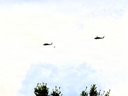 Wisconsin National Guard UH-60 Black Hawks fly members of Packers tour to Fort McCoy