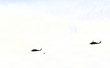 Wisconsin National Guard UH-60 Black Hawks fly members of Packers tour to Fort McCoy