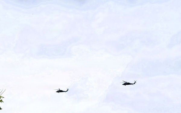 Wisconsin National Guard UH-60 Black Hawks fly members of Packers tour to Fort McCoy