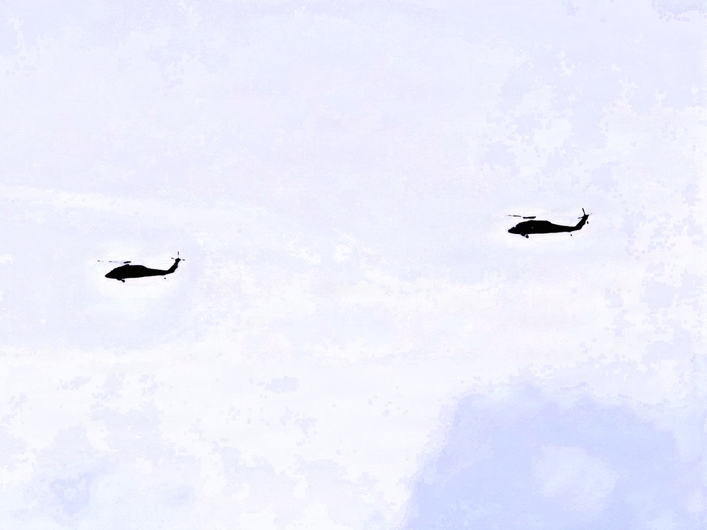 Wisconsin National Guard UH-60 Black Hawks fly members of Packers tour to Fort McCoy