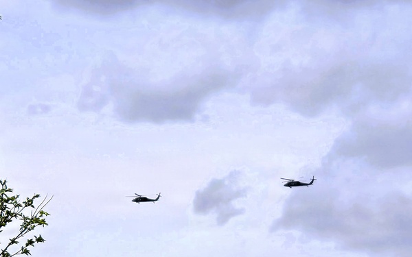 Wisconsin National Guard UH-60 Black Hawks fly members of Packers tour to Fort McCoy