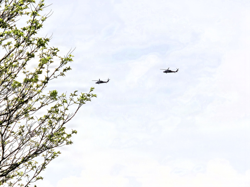 Wisconsin National Guard UH-60 Black Hawks fly members of Packers tour to Fort McCoy