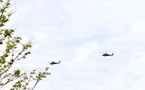 Wisconsin National Guard UH-60 Black Hawks fly members of Packers tour to Fort McCoy