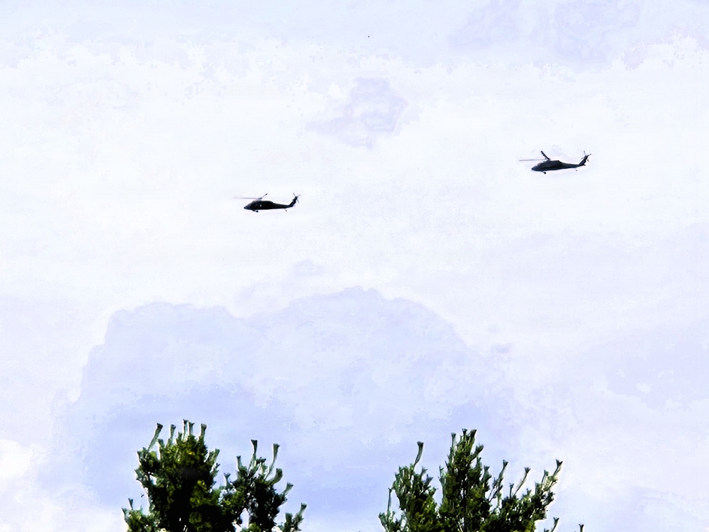 Wisconsin National Guard UH-60 Black Hawks fly members of Packers tour to Fort McCoy