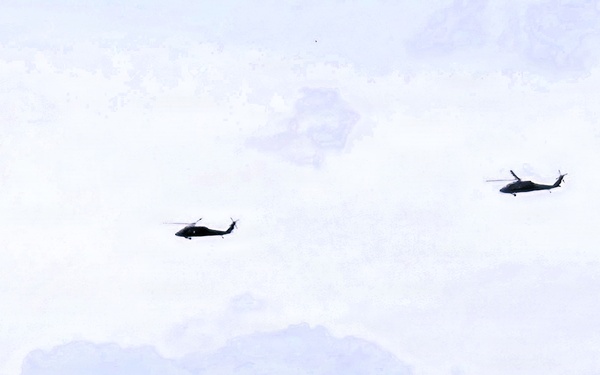 Wisconsin National Guard UH-60 Black Hawks fly members of Packers tour to Fort McCoy