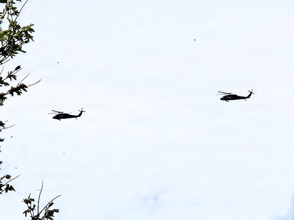 Wisconsin National Guard UH-60 Black Hawks fly members of Packers tour to Fort McCoy