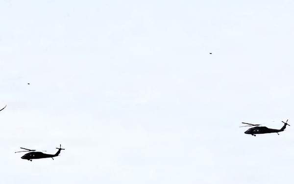 Wisconsin National Guard UH-60 Black Hawks fly members of Packers tour to Fort McCoy