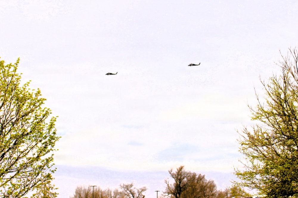 Wisconsin National Guard UH-60 Black Hawks fly members of Packers tour to Fort McCoy