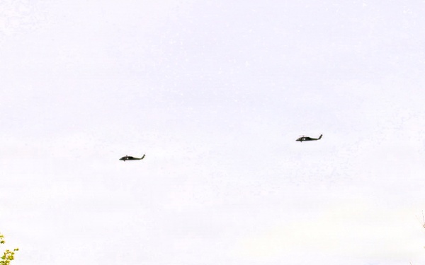 Wisconsin National Guard UH-60 Black Hawks fly members of Packers tour to Fort McCoy