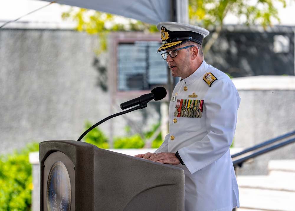 Royal Australian Navy Rear Adm. Terence Morrison, deputy director of maritime operations, delivers commemorative address during an Anzac Day ceremony at Punchbowl Cemetery
