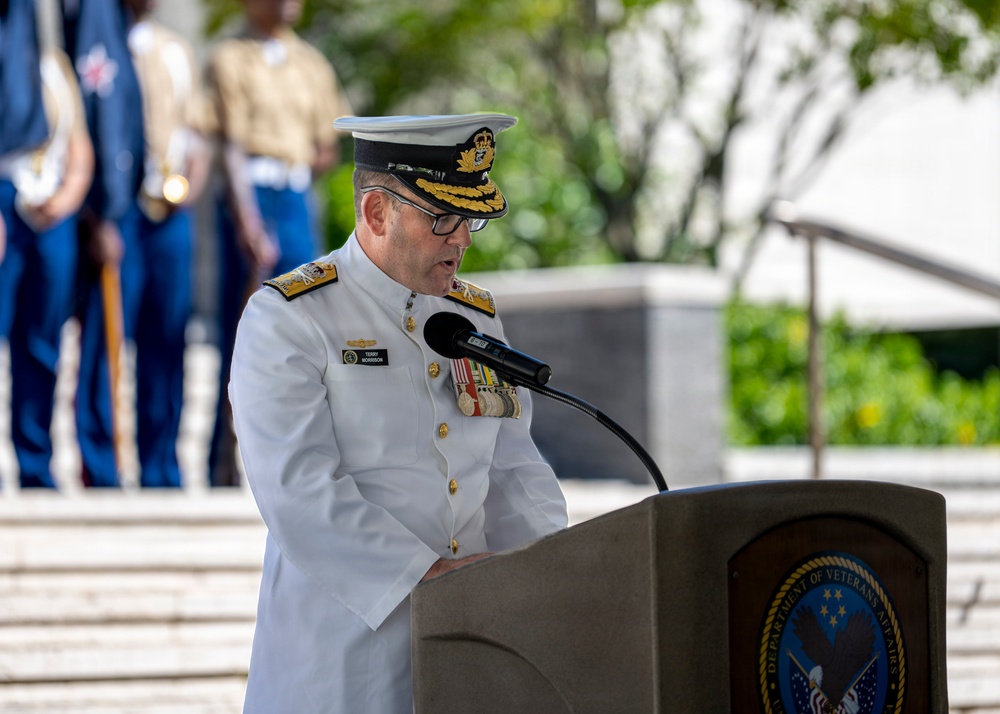 Royal Australian Navy Rear Adm. Terence Morrison, deputy director of maritime operations, delivers commemorative address during an Anzac Day ceremony at Punchbowl Cemetery