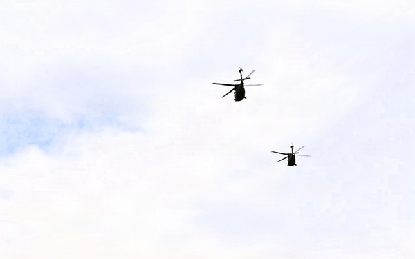 Wisconsin National Guard UH-60 Black Hawks fly members of Packers tour to Fort McCoy