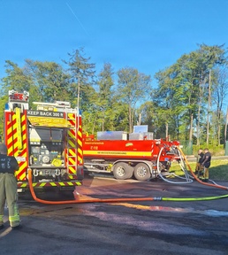 USAG Rheinland-Pfalz, German firefighters unite to battle autobahn brush fire
