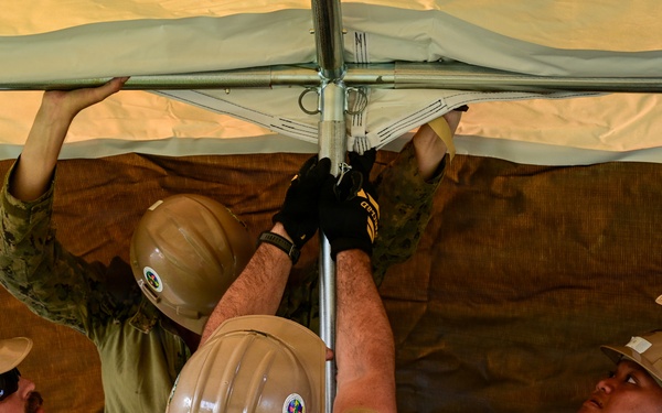 NMCB-1’s Seabees construct temporary shelter for Tinian citizens affected by Typhoon Sinlaku