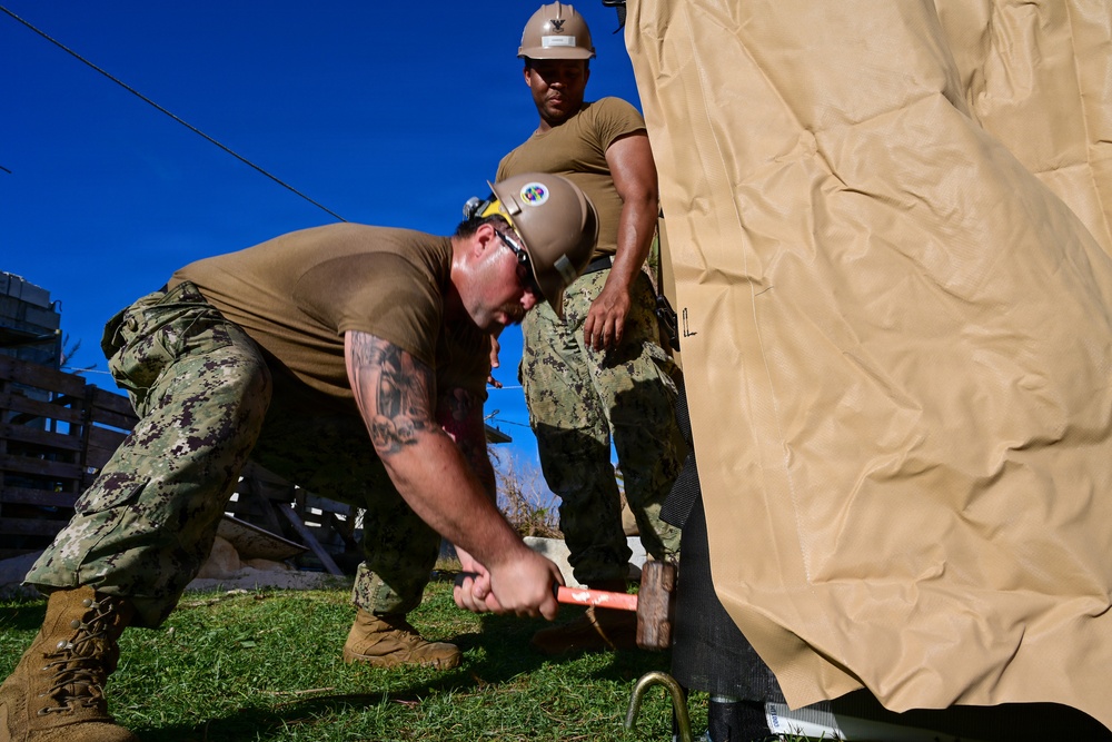 NMCB-1’s Seabees construct temporary shelter for Tinian citizens affected by Typhoon Sinlaku