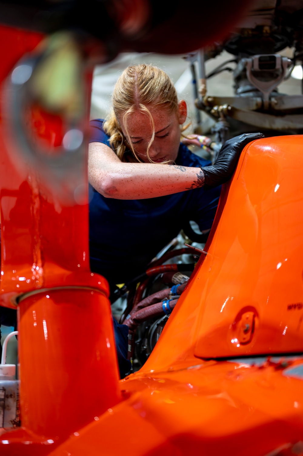 Coast Guard avionics technician conducts maintenance at Air Station Houston