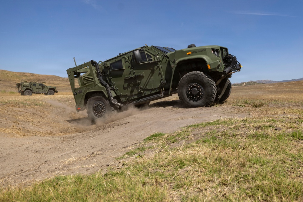 U.S. Marines take the wheel during JLTV operator course
