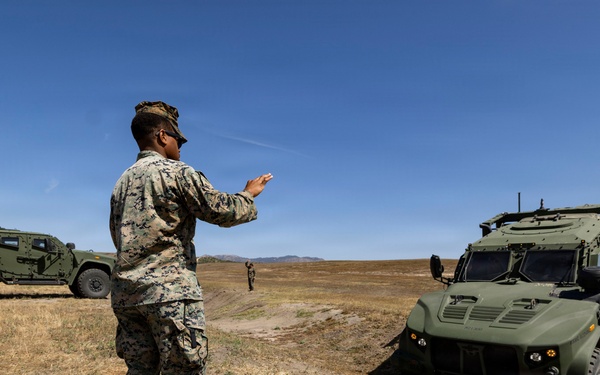 U.S. Marines take the wheel during JLTV operator course