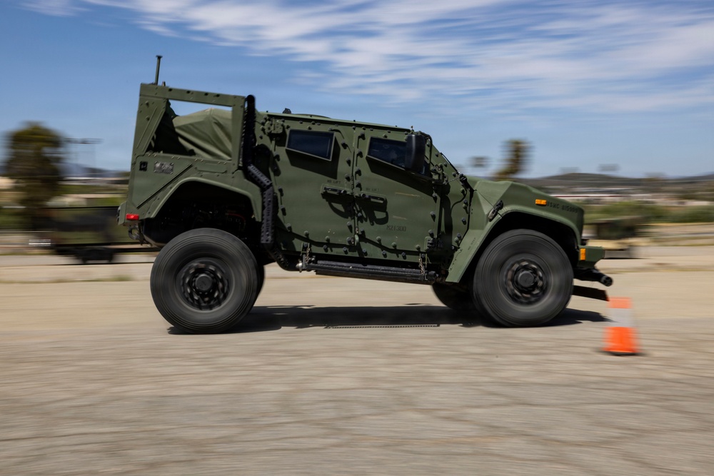U.S. Marines take the wheel during JLTV operator course