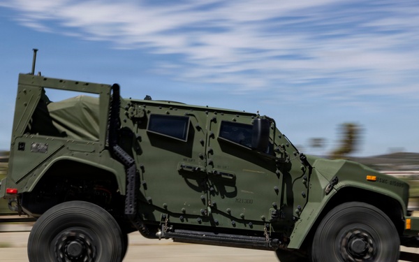 U.S. Marines take the wheel during JLTV operator course