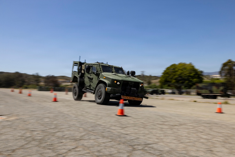 U.S. Marines take the wheel during JLTV operator course
