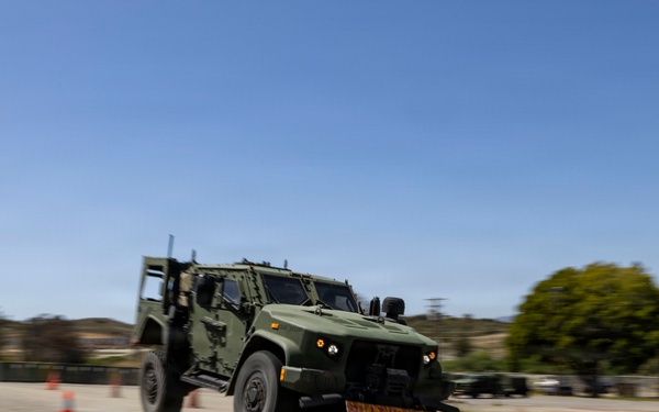 U.S. Marines take the wheel during JLTV operator course